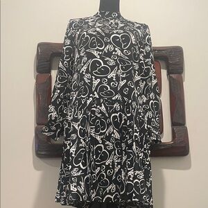 Elegant Black and White Heart Pattern Dress with Cape